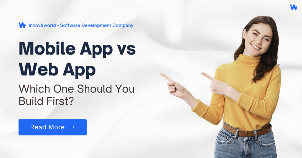 Mobile App vs Web App: Which Should You Build First? 6 Team of developers discussing mobile app vs web app development strategies at a tech startup